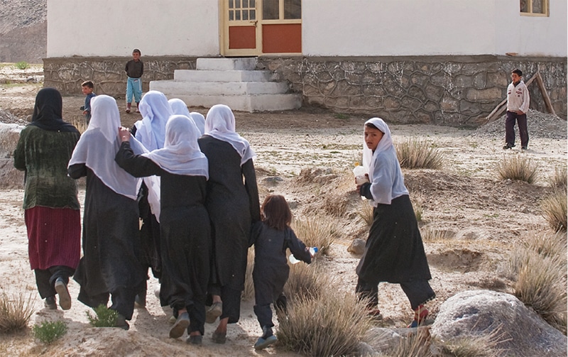 Group of Afghan girls walking to school