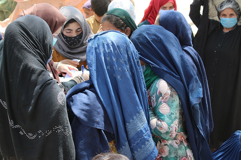 Women receiving aid packages