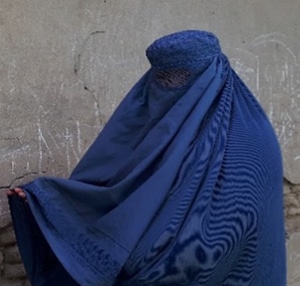 Woman wearing blue burqa