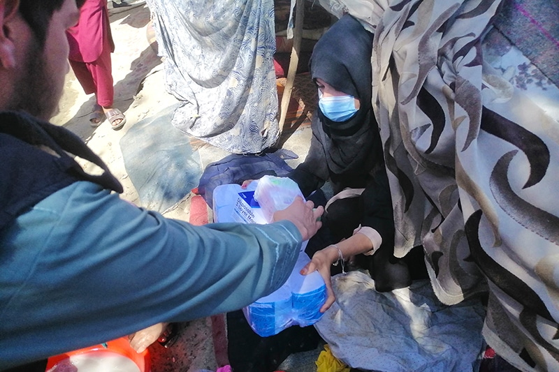 Women receiving aid package