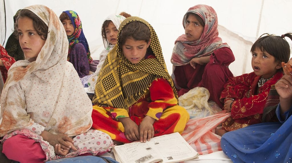 Afghan girls in a tent school