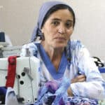 Woman in Tajikistan with sewing machine