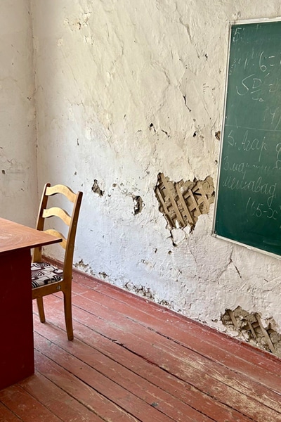 Damaged wall in classroom