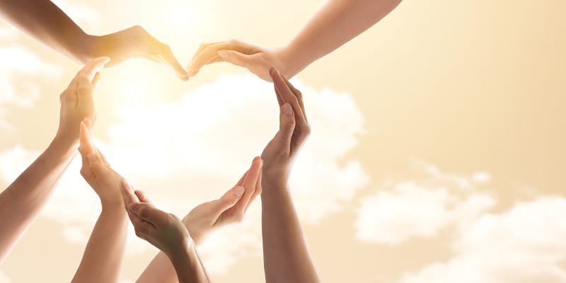 Hands forming a heart shape