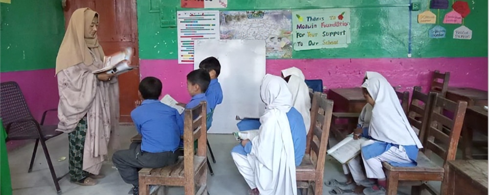 Sughra teacher in classroom in Pakistan