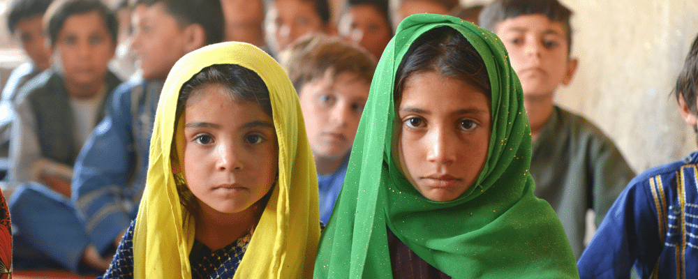 Afghan girls sitting in the classroom in Afghanistan.