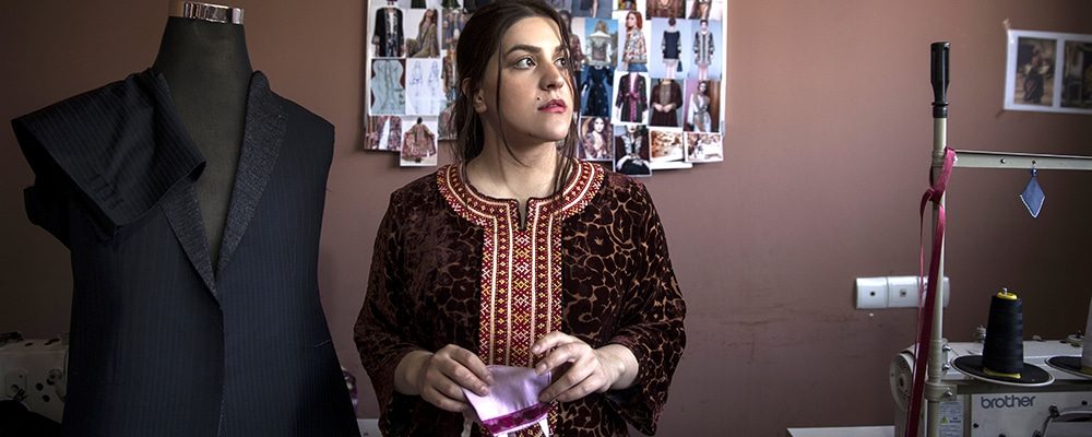 Afghan woman in her sewing studio