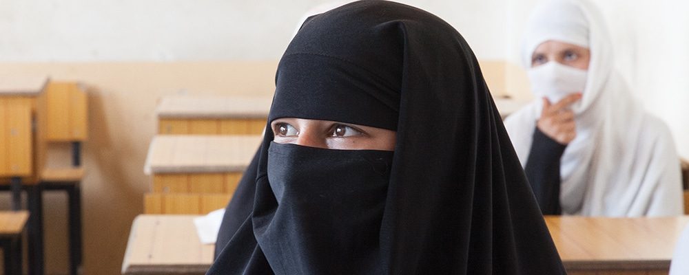 Afghan woman with black hijab